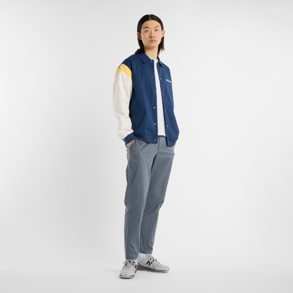 New Balance Athletics Varsity Jacket in BLAU