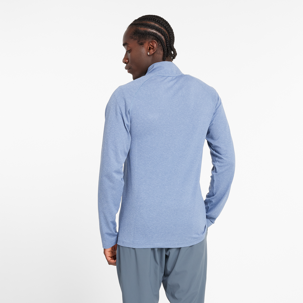 NB Athletics Seamless 1/4 Zip heron blue model_bild_back_brandshop