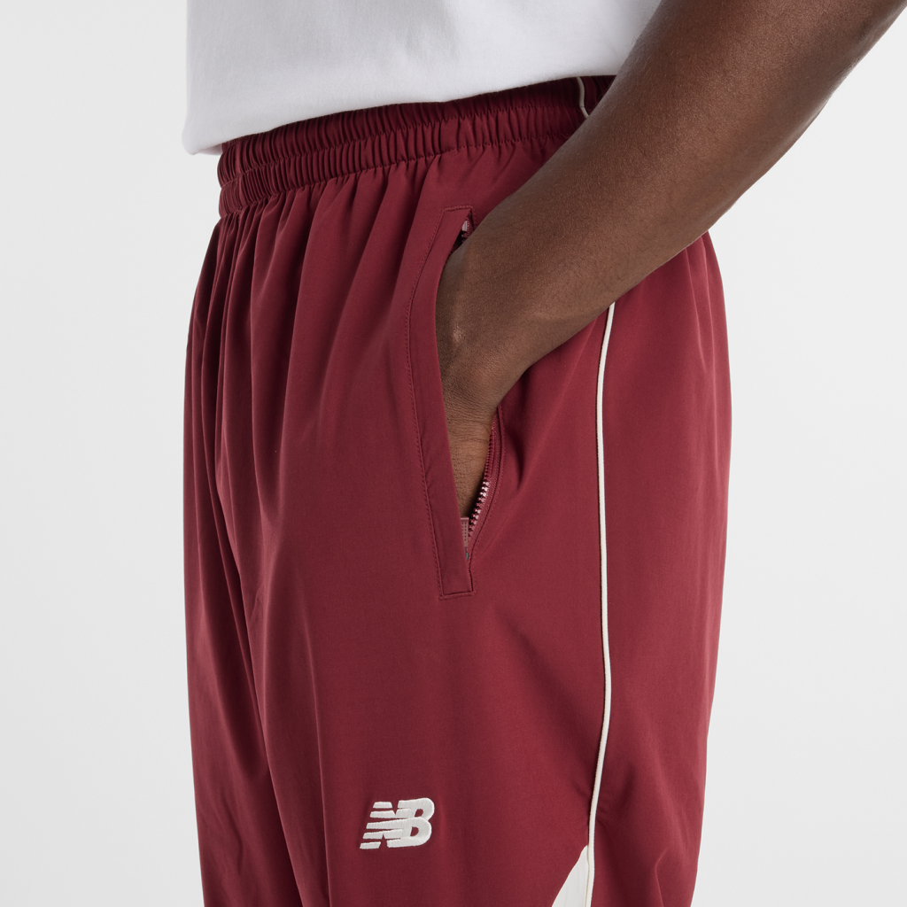 New Balance In Game Woven Track Pant in ROT