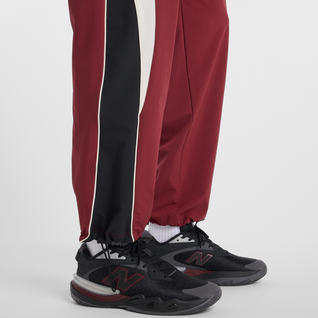 New Balance In Game Woven Track Pant in ROT