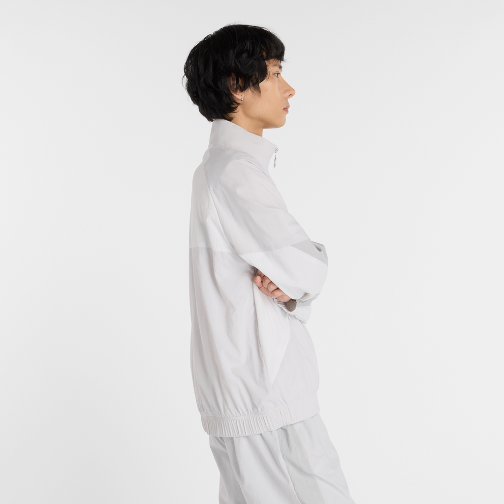 New Balance Achieve Jacket in BLAU